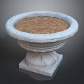 Decorative Round Stone Planter With Carved Details And Soil Filled Interior