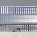 Modern Building Facade With Large Arched Glass Windows And Transparent Glass Doors