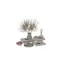 Ceramic Vessels In Ribbed And Curved Shapes With Dried Branches Incense Sticks On Stacked Books