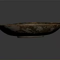 Carved Sculptural Bowl With Intricate Textured Surface And Earthy Blue Brown Hues