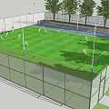 Fenced Football Field with Green Grass Surrounded by Trees and Players Playing