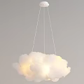 Cloud Shaped Pendant Light Hanging via Thin Wires Against Gray Background with Soft Warm Glow