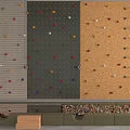 Sports Equipment For Climbing Wall With Colorful Holds And Safety Mats