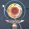Divine Bird Themed Art Installation With Silver Base Gold Ornament And Blue Rings