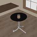 Modern Round Side Table With Black Top And Chrome Rolling Base In Bright Room 3d model