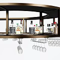 Elegant Circular Bar Display With Black Countertop Metal Frame Liquor Bottles And Hanging Wine Glasses