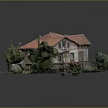 Small House Model With Red Roof White Walls And Surrounding Green Plants