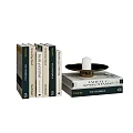 Stacked Architectural Theories Books With Decorative Candle Holder And White Candle