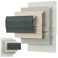Various Toned Curtain Fabric Samples with Textured Surfaces Stacked for