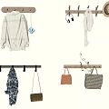 Wooden Wall Hooks With Sweater Headphones Scarf Hats And Bags On Beige Wall