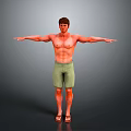 Man in green shorts and sandals with arms outstretched on gray background