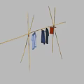 Two Bamboo Clothes Drying Racks With Hanging Blue Dark Red Garments 3d model
