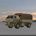 Beige Military Truck With Canvas Covered Cargo Bed In Open Field Sunset Sky