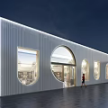 Modern Storefront Facade With White Metallic Texture Arched Windows And Lighting Accents