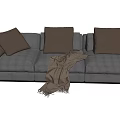 Gray Upholstered Three Seater Sofa With Brown Cushions And Throw Blanket 3d model