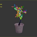 Vibrant Lemon Tree with Green Leaves and Yellow Lemons in Gray Pot