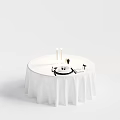 Round Dining Table With White Tablecloth Candles Cutlery Wine Glass And Food Plate