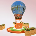 Blue Inflatable Hot Air Balloon Featuring Orange Frame Circular Platform Central Logo and Wooden Planters