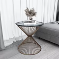 Stylish Coffee Table With Metal Wire Frame Glass Top And Dried Pampas Grass Near Sofa
