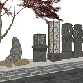 Outdoor Stone Pillar Lights with Red Maple Tree Stones and Brick Wall on Stone Pavement