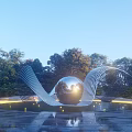 Modern Sculpture Featuring Metal Sphere And Curved Metal Strips In Water With Trees And Lighting