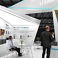 Modern ESAM Exhibition Booth With Product Displays And Visitor Interaction Zones