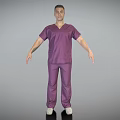 A Man Standing in Purple Scrubs Against Gray Background With Neutral Setting