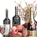 Wine Bottles and Wine Glasses with Pomegranates Macarons Berries and Decorative Flowers