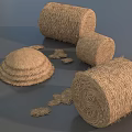 Round Hay Bales And Scattered Hay Piles In Natural Rural Setting
