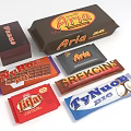 Assorted Chocolate Bars From Various Brands With Colorful Packaging Designs