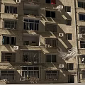 Multi Storey Residential Building Featuring Light Colored Exterior Balconies Air Conditioning Units And Windows