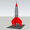Red And Gray Rocket Model Design With Pointed Nose And Fins