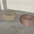 Round Petal Textured Cushions In Beige And Light Pink On Marble Floor