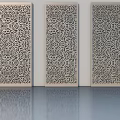 Three Elegant Carved Screens With Intricate Floral Patterns On White Wall Background