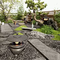 Tranquil Courtyard Garden Design With Stone Lantern Pebble Path Pine Tree And Green Plants