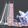 Art Installation With Colorful Flowers And Large Butterfly Sculpture Beside Escalator