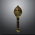 Intricate Brown Sculpture Carving With Golden Top Ornament And Detailed Patterns