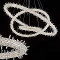 Modern Crystal Chandelier With Intertwined Ring Design And Sparkling Crystal Beads