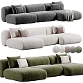 Plush Sectional Sofa in Neutral and Green Tones with Soft Cushions and Throw Blanket