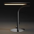 Modern Black Table Lamp With Curved Stand Round Base And Sleek Design