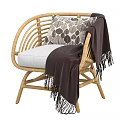 Natural Style Wicker Single Sofa With White Cushion Dark Blanket And Decorative Pillow