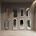 Decorative Mirrors In Various Shapes On Grey Wall With Natural Light For Modern Room