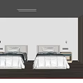 Modern Hotel Guest Room With Twin Beds Bedside Lamps And Wooden Flooring
