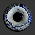 Blue and White Vase with Colorful Floral Geometric Patterns Irregular Rim on Black Background Reflection