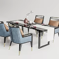 Modern Black Dining Table Set With Blue Chairs Gold Legs And Brown Cushions Vase