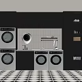 Modern Laundry Room With Stacked And Side By Side White Washing Machines Black Cabinets
