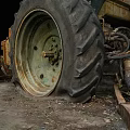 Old Rusty Farm Tractor Parked on Muddy Ground with Visible Body Rust 3d model