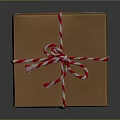Festive Gift Box With Red And Green Plaid Pattern And Red White Striped Ribbon