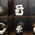 Elegant Decorative Ornament Set on Dark Shelves with Various Geometric Designs and Illuminated