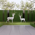 White Deer Sculptures In Garden With Green Hedge Grass And Trees Stone Pavement